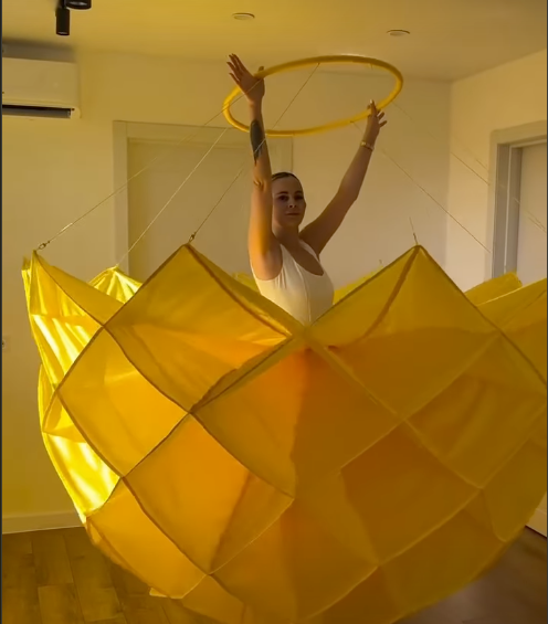 Yellow fabric structure with hoop
